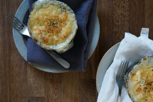 How to Create a Gourmet Potato Gratin with a Crispy Cheese Topping and Fresh Thyme?
